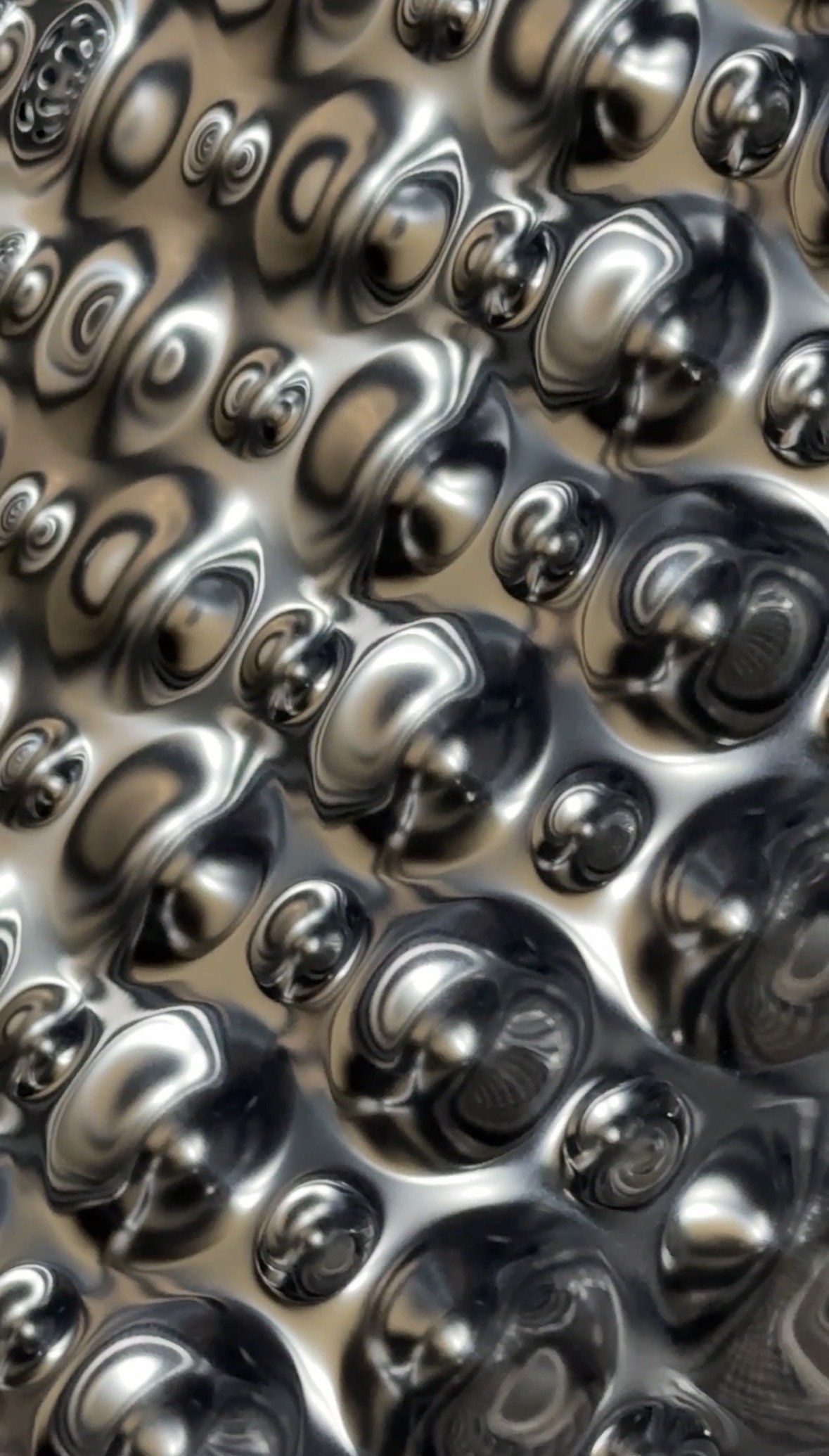 abstract reflective metal pattern that looks like a 3D render