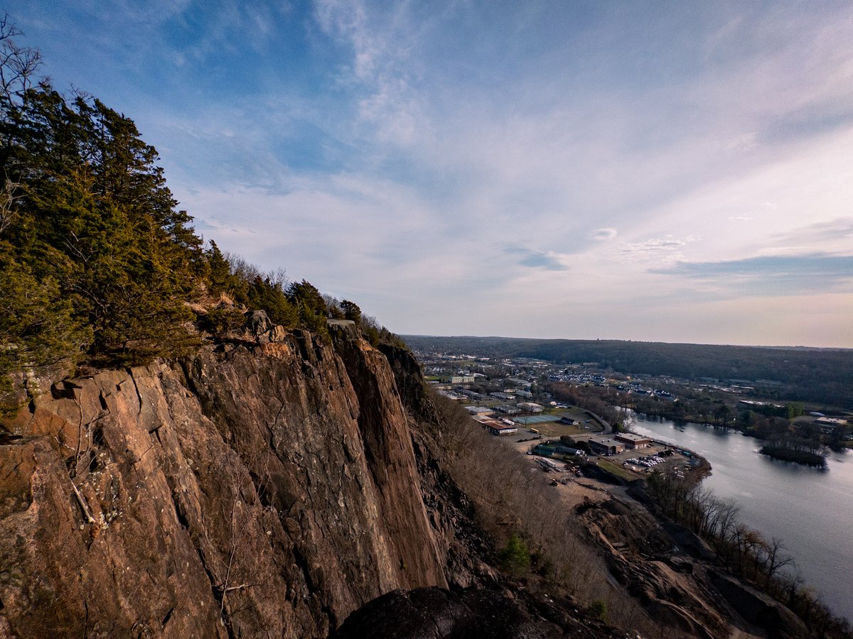 cliff with a lake below