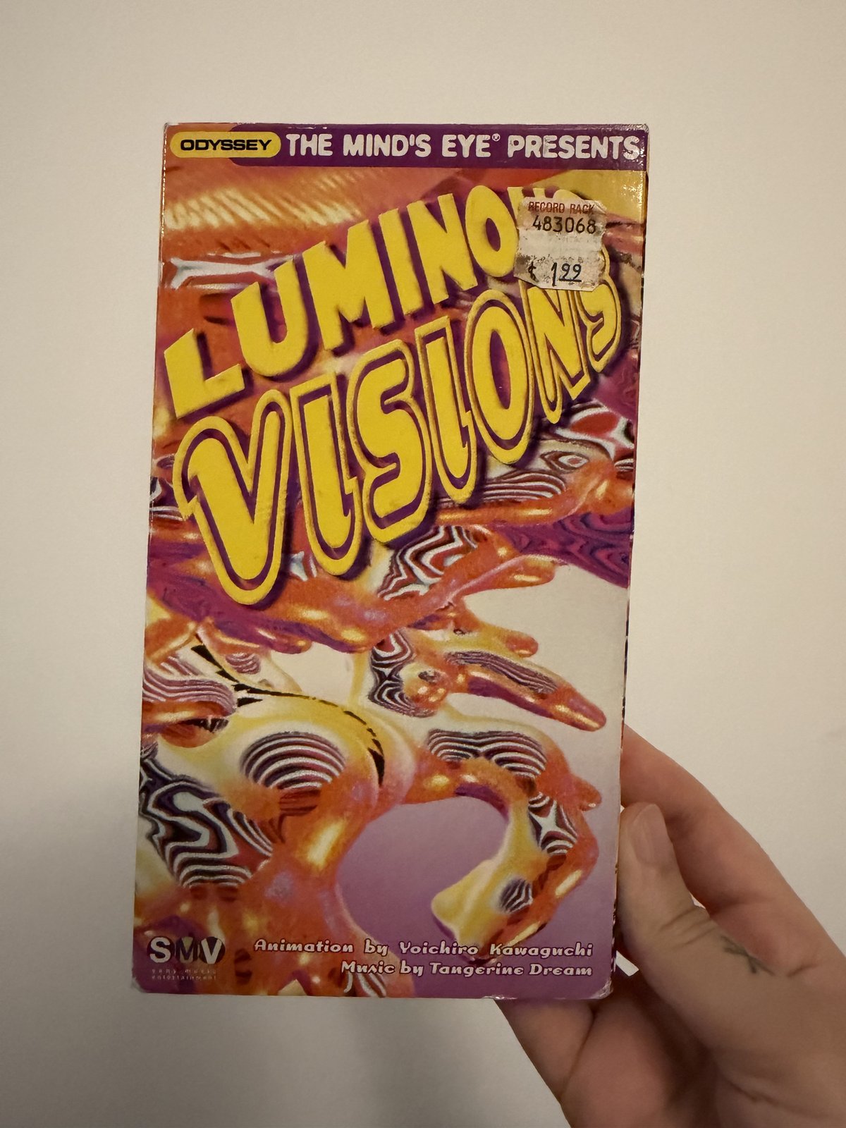 vhs tape called luminous visions with psychedelic 3D art