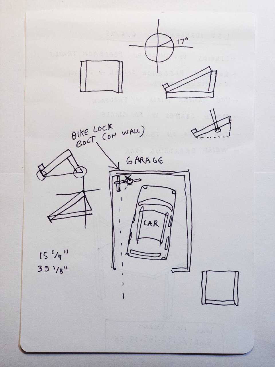 diagram of where the bike lock should be placed in my garage surrounded by early sketches of the speaker stand
