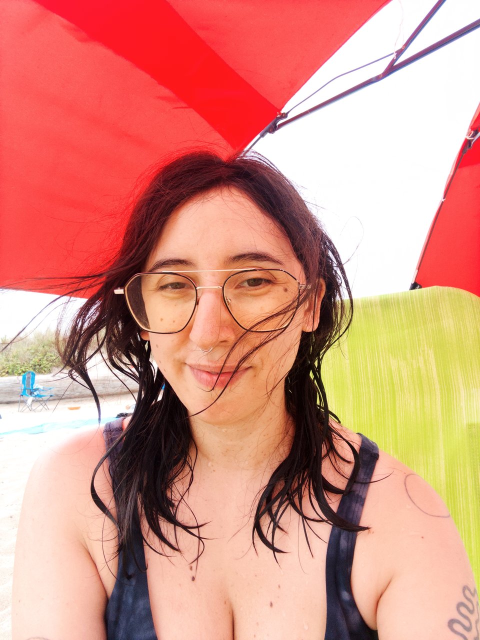 a selfie of the journal author at the beach