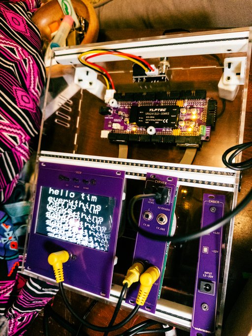 a modular video synth in a clear acrylic case with an lcd display built in
